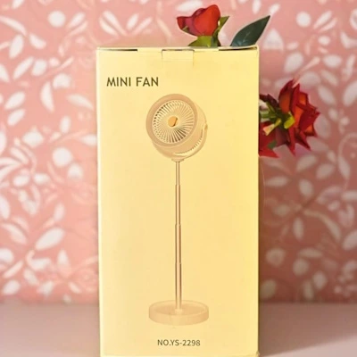WhatsApp Image 2025-07-03 at 12.49.07 PM MINI FAN" model number "NO.YS-2298." portable, rechargeable fan designed for personal use in various settings like home, office, or outdoors